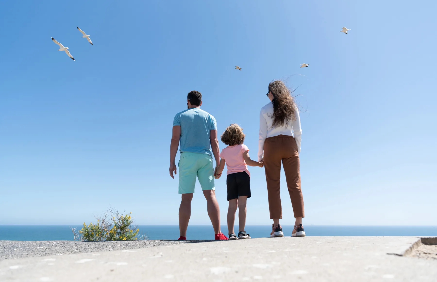 Family looking toward the horizon